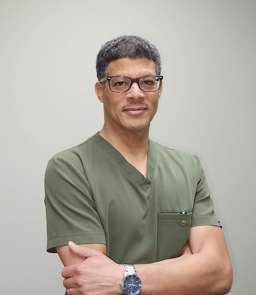 Portrait of Elderly Couple Hiking Mountains and Smiling